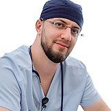 Врач Алиев Малик Абдулаевич