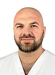 Врач Атенбеков Руслан Радикович