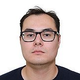 Врач Бадлаев Олег Викторович