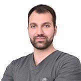 Врач Даурбеков Ислам Исропилович