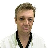 Врач Дрожжин Максим Николаевич