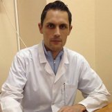 Врач Джаджиев Андрей Борисович