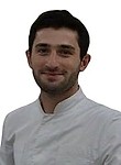 Врач Каракизов Амирхан Георгиевич