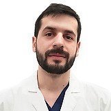 Врач Хусаинов Ислам Эмиевич