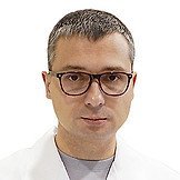 Врач Комолов Евгений Юрьевич