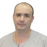 Врач Корзун Андрей Никитич