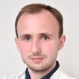 Врач Кученов Роман Геннадьевич