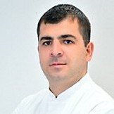 Врач Кушу Руслан Теучежевич