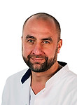Врач Лакомкин Максим Михайлович