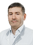 Врач Мугадов Шамиль Романович