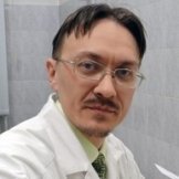 Врач Николаев Андрей Борисович