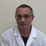 Врач Попов Гарольд Витальевич