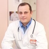 Врач Присягин Юрий Андреевич