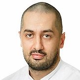 Врач Рамонов Давид Казбекович