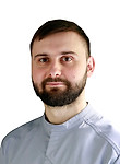 Врач Титов Эмин Эминович