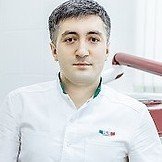 Врач Тлигуров Ильяс Абубакирович
