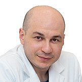 Врач Торчинов Асланбек Русланович