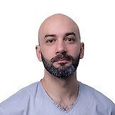 Врач Урусов Рустам Измаилович