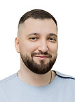 Врач Узбиков Радик Марсович